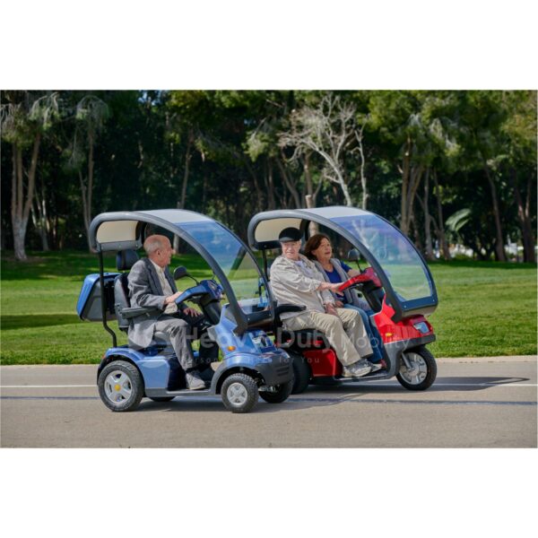 Live Style Image Side View of Blue Afiscooter S4 with Canopy Mobility Scooter, Red Afiscooter S3 Dual Seat Mobility Scooter with Canopy Golf Tires