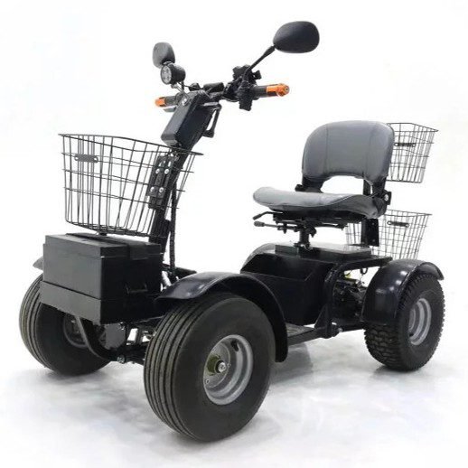 All-terrain mobility scooter with large tires and dual storage baskets.