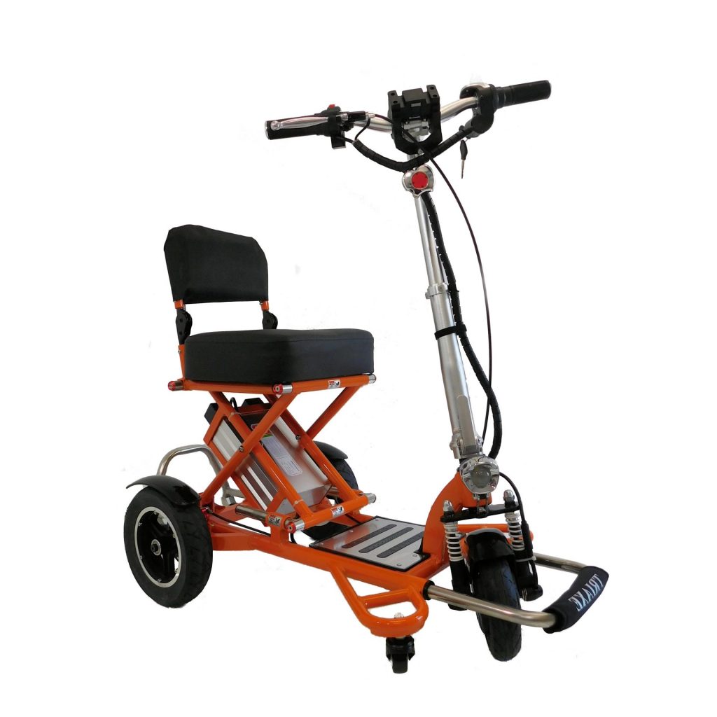 A compact orange electric mobility scooter with a padded seat and backrest. The scooter features three wheels for stability, handlebars with controls, and a sturdy frame. It is designed for personal transportation and appears foldable for convenience.