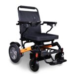 Front side view of the EWheels EW-M45 wheelchair in black with vibrant orange highlights, emphasizing its modern design and standout colors.