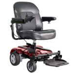 Front side view of the Merits EZ-GO / EZ-GO Deluxe wheelchair in striking red color, highlighting its vibrant hue, compact design, and user-friendly features