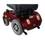 Rear view of the lower part of the Merits Gemini 1 wheelchair, focusing on the wheels and frame, showcasing the sturdy construction