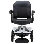 Front view of the Merits EZ-GO / EZ-GO Deluxe wheelchair, showcasing its compact design, ergonomic features, and user-friendly controls