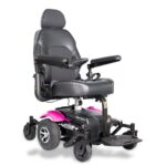 Merits Vision Sport wheelchair in pink, front side view, displaying its stylish design and comfy seating