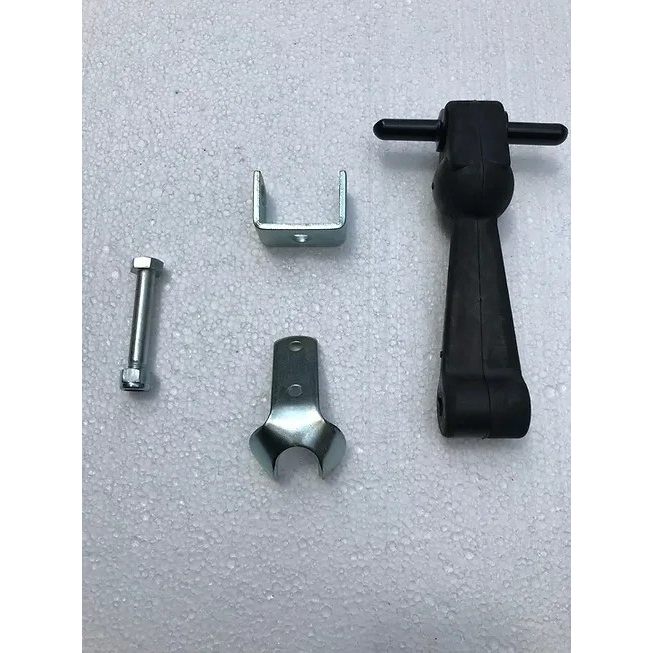 Components of a Scoota Trailer's old 'T' style rubber hood latch system, including a metal hook, latch bracket, and the 'T' shaped rubber handle