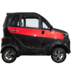 A side view of the Green Transporter Q Express featuring a sleek black chassis with red accents, exemplifying a modern design for urban mobility.