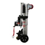 Side view of the Enhance Mobility Hercules portable lift, featuring a vertical aluminum column with a winch and hooks, red safety straps, and black wheels for easy maneuverability