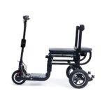 Side view of the eFOLDi Lite, a foldable and lightweight mobility scooter designed for easy transport and storage. The scooter is presented in its unfolded state, ready to use, showcasing its sleek black frame, padded seat, and user-friendly control handle with intuitive throttle controls.