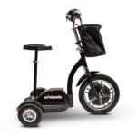 A striking black EWheels EW-18 Stand-n-Ride scooter from a side view, highlighting the robust front wheel, dual rear wheels, and a black basket on the handle