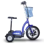 The EWheels EW-18 Stand-n-Ride electric scooter shown in profile, in blue with a black plaid basket, featuring a prominent front wheel and compact rear wheels on a sleek design