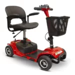 A red color EWheels EW-M34 mobility scooter featuring a comfortable chair with armrests, a large black basket on the front, and a red T-bar handle with throttle control