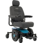 Pride Mobility Jazzy EVO 613 power wheelchair in a striking iceberg blue, featuring high-back black seat, flip-up armrests, and mid-wheel drive for stability.