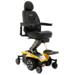 A bright citrine yellow Pride Mobility Jazzy Air 2 power wheelchair with a comfortable high-back chair and black accents, designed for smooth navigation and user independence.