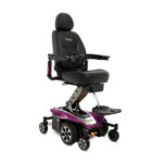 Pride Mobility's Jazzy Air 2 power wheelchair in pink topaz color, featuring a high-rise black seat, modern design, and sturdy wheels for mobility support.