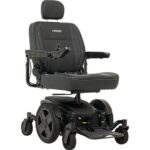 Contemporary Pride Mobility Jazzy EVO 614 power wheelchair, showcasing a sleek black finish with a high-back seat and user-friendly joystick navigation.
