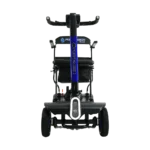 Forcemech Traveler Lightweight Folding Mobility Scooter Forcemech Traveler Lightweight Folding Mobility Scooter in blue shown from the front with a bright headlight and standing upright.
