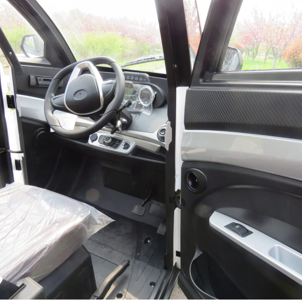 Green Transporter Electric Delivery Cargo Mini Truck Inside Close Up