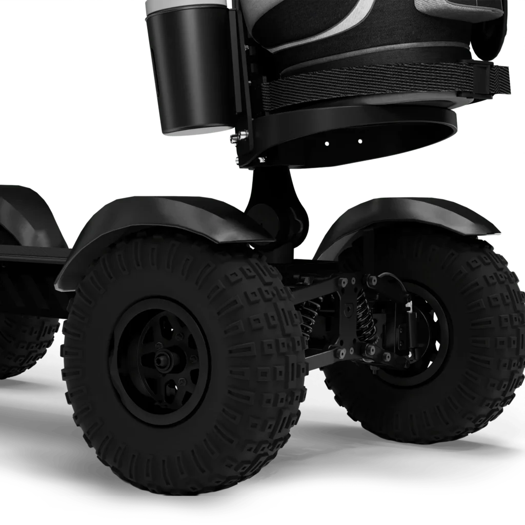 Close up view of CycleBoard X Quad 3000 14" tire suspension and rear wheel