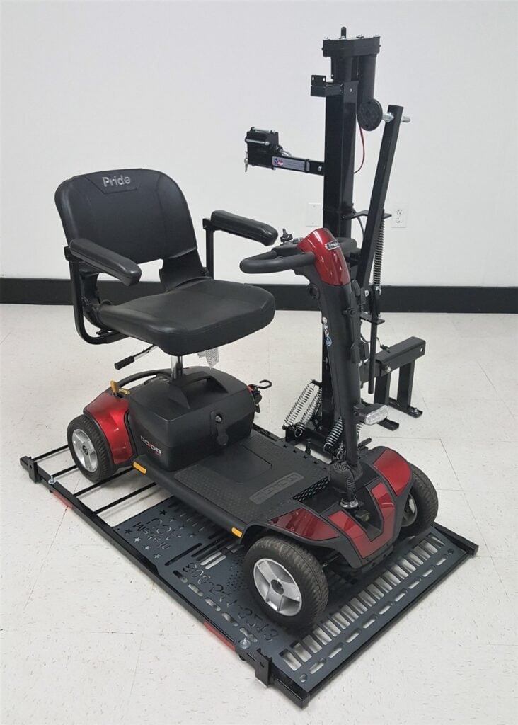 Mobility scooter loaded and secured on the Hold N Go US218 platform