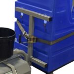 Close-up of the gray I bracket and yellow ratchet strap holding a laundry bin to the 1062-LS