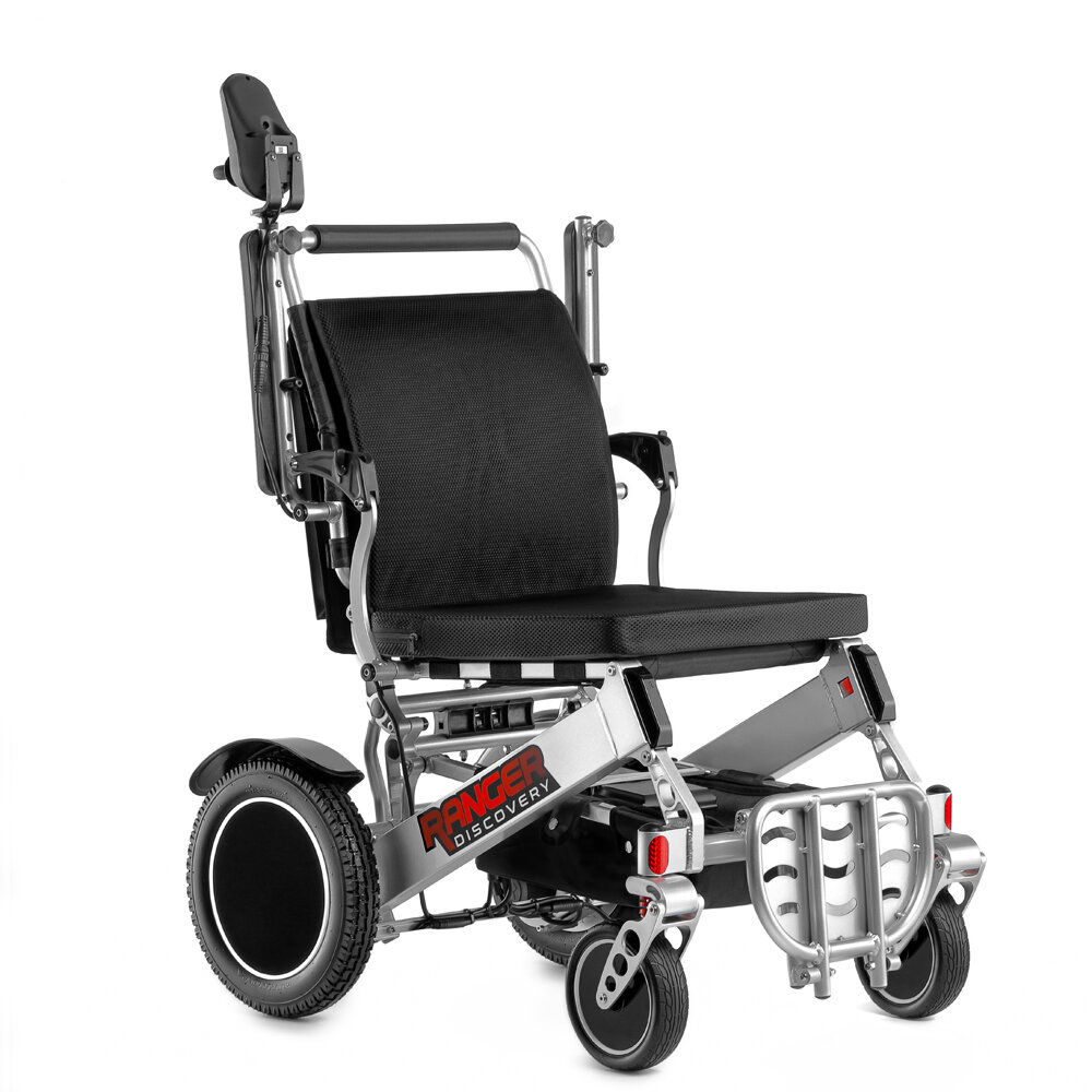 Porto Mobility Ranger Discovery folding power wheelchair with joystick arm raised and footplate flipped up