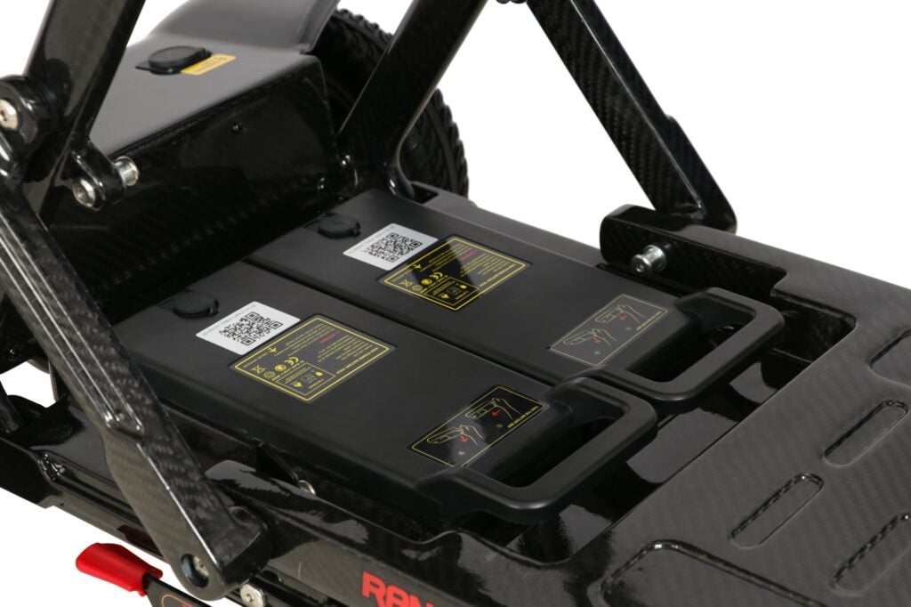 Porto Mobility Ranger Ivy folding scooter, close up of two battery packs with carry handles in the deck